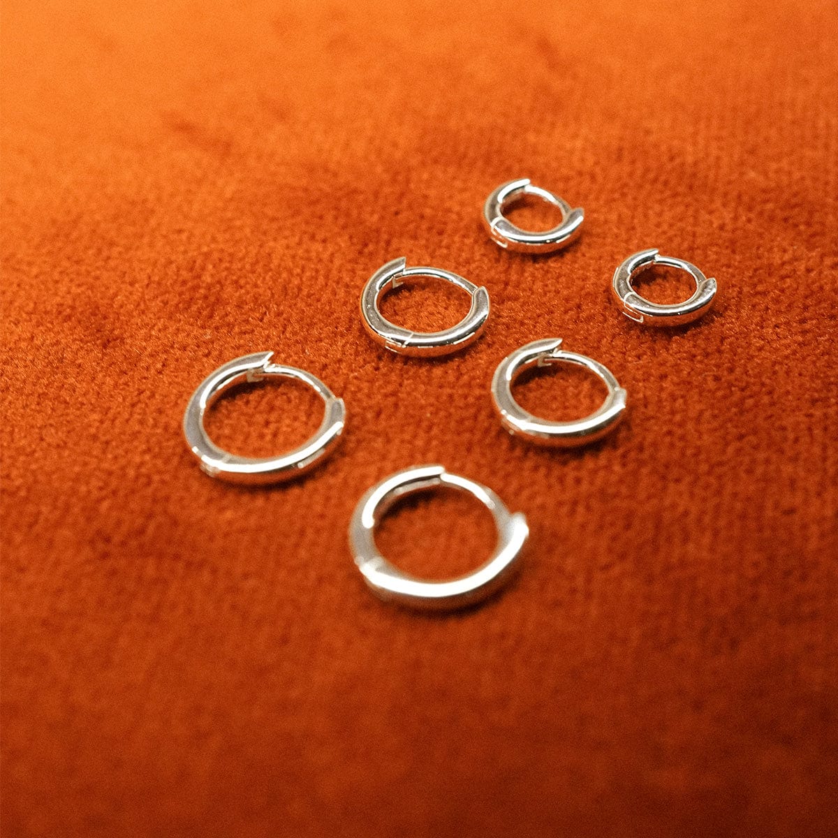 Daisy Polly Essential Silver Huggie Hoop Earrings - Image 17