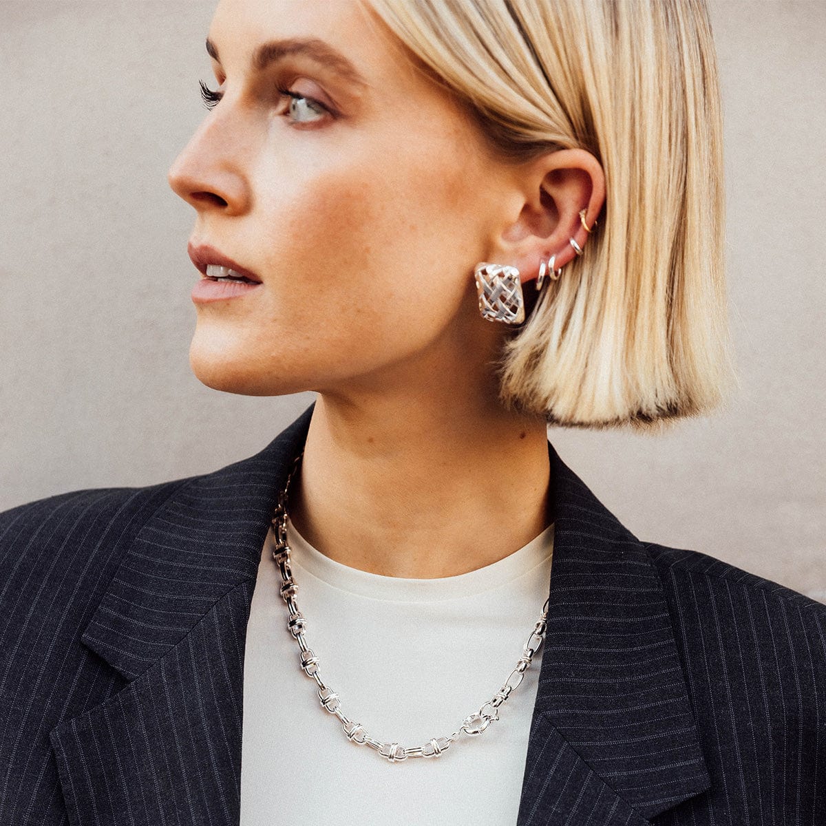 Daisy Polly Essential Silver Huggie Hoop Earrings - Image 4