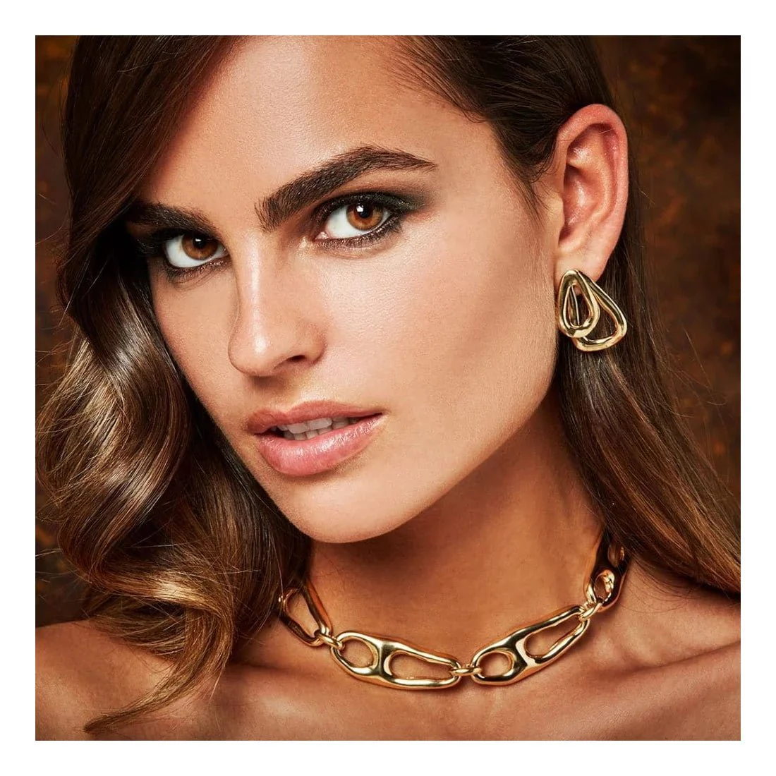 UNOde50 Gold Connected Earring - Image 4